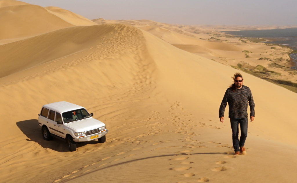 Awesome Chapters
Land Cruiser and Evert on the lookout dune at Sandwich Harbor